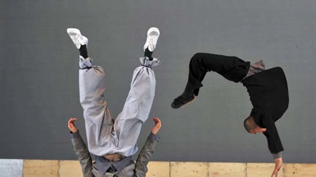 Leaps of faith ... Belgian choreographer Sidi Larbi Cherkaoui and one of the 17 Shaolin monks demonstrate their acrobatic skills in Sutra.