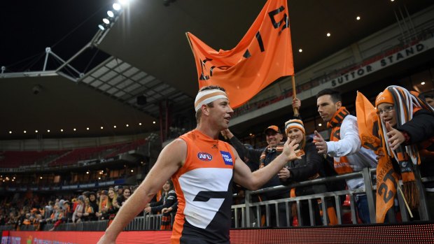 Giant performance: Steve Johnson after his six-goal haul. But it came in front of the smallest AFL finals crowd since World War I. 