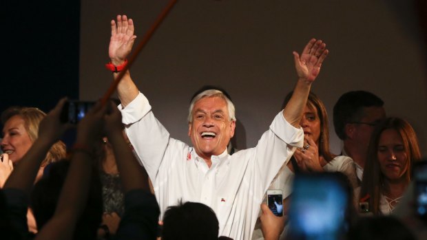 Former Chilean President Sebastian Pinera celebrates the first official results that place him in first place in the elections, in Santiago, Chile, on Sunday.