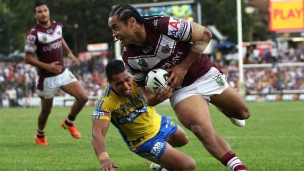 Club stalwart: Manly centre Steve Matai scores the match-winning try against Parramatta in March.