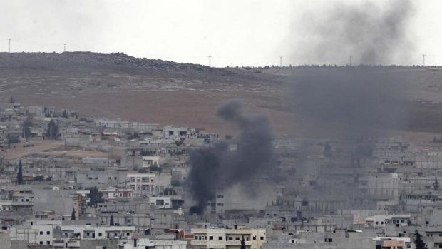 Smoke billows in Kobane after an air strike by the US-led coalition.