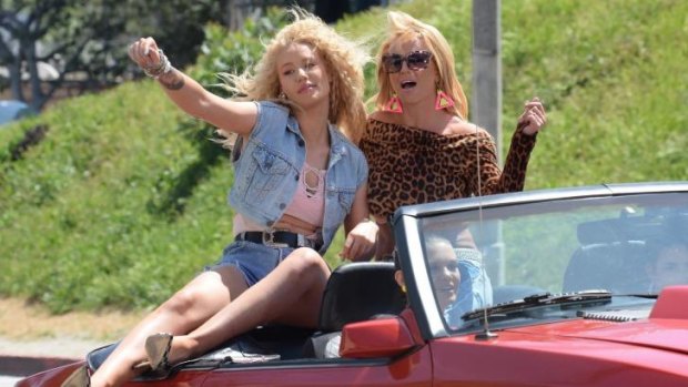 Iggy Azalea and Britney Spears on the set of their music video in Los Angeles in April.