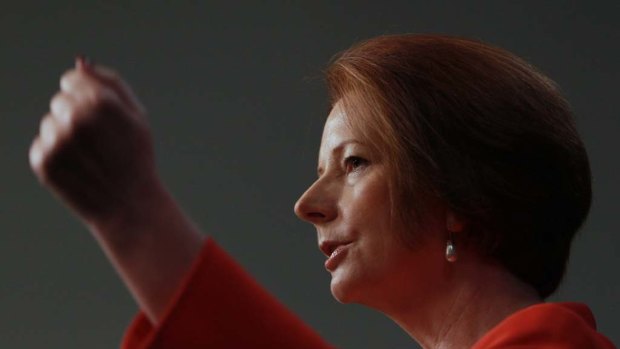Prime Minister Julia Gillard facing the media in Canberra today.
