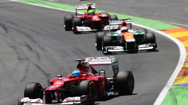 Fernando Alonso of  Ferrari leads the way at the European Grand Prix.