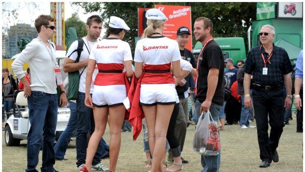 Grid girls get among the fans. 