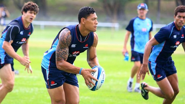 Switched on &#8230; Israel Folau trains with the Waratahs.