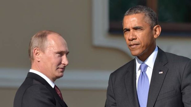 Russian President Vladimir Putin and US President Barack Obama shake hands. Mr Putin appears to have the upper hand in diplomacy over Syria.