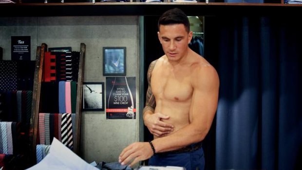 Sonny Bill Williams suits up for his Sydney Roosters press conference on Tuesday.