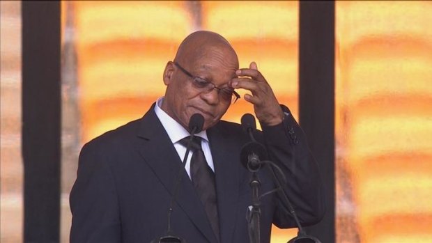 Booed: South African President Jacob Zuma at the lectern.