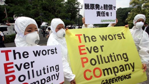 Members of Greenpeace took to the streets of Tokyo on Tuesday.