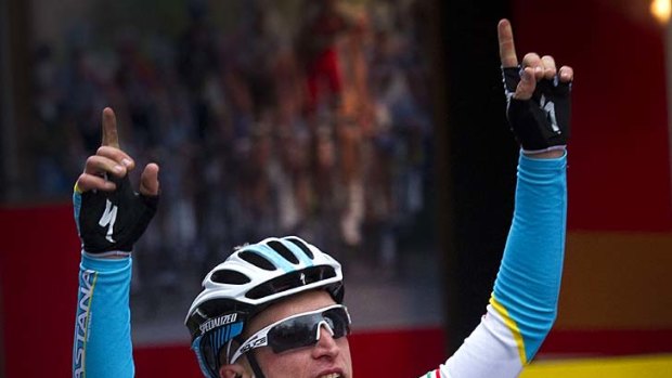 Italy' Enrico Gasparotto of Astana team crosses celebrates his win.