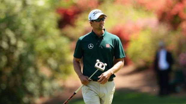 Adam Scott walks up to 13th green during the first round of the 78th Masters in Augusta, Georgia.