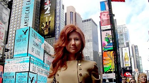 Accused spy Anna Chapman poses in New York's Times Square.