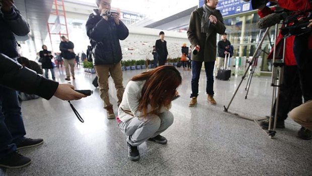 A woman believed to be a relative of a passenger on Malaysia Airlines flight MH370.