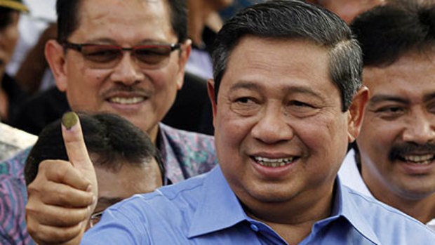 Thumbs up . . . Dr Yudhoyono after voting.