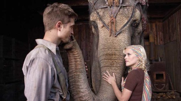 This baby ain't digitally enhanced, honey: Jacob (Robert Pattinson) and Marlena (Reese Witherspoon) share a moment with a real pachyderm in the passable melodrama Water for Elephants.