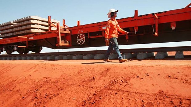 Onward and upward: Rio Tinto, Fortescue and BHP are poised to unveil increased iron ore production.