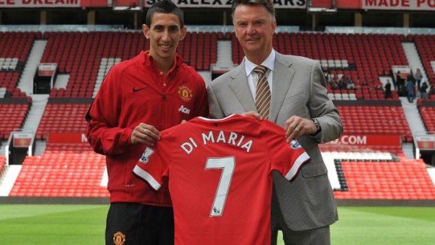 New faces: Louis van Gaal (right) with Manchester United's new signing, midfielder Angel Di Maria.