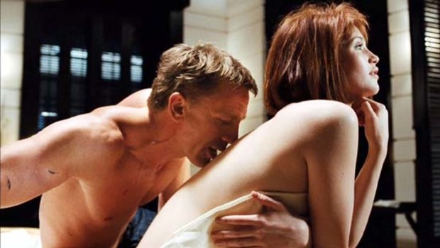 Gemma Arterton with Daniel Craig in Quantum of Solace.