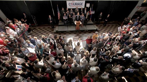 Extolling Reagan &#8230; Republican candidate Rick Santorum addresses a rally in Topeka, Kansas.