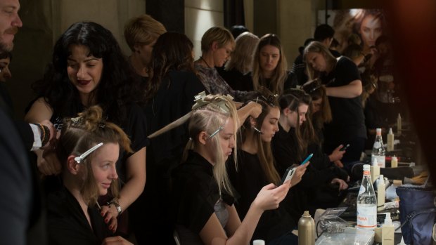 Models have their hair done by Kevin Murphy artists backstage at Melbourne Spring Fashion Week.