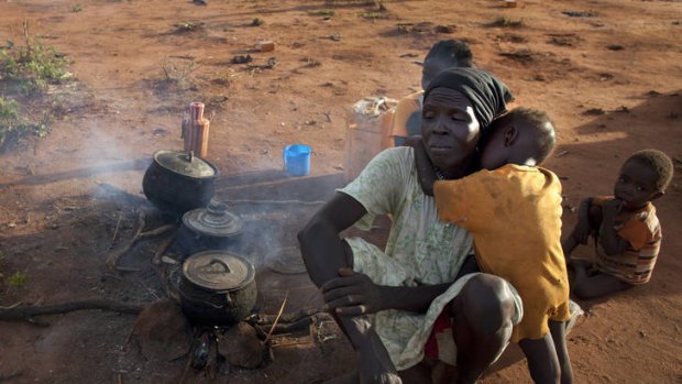 New arrivals sit with no shelter at Yida refugee camp in South Sudan. Many walked for up to five days to reach the camp, where they have no food.