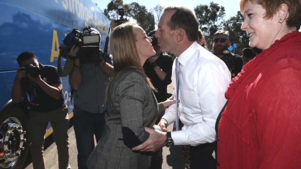 Opposition Leader Tony Abbott greets Liberal Party candidate Fiona Scott.