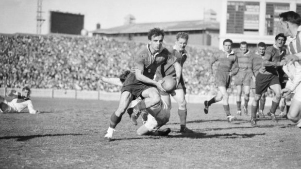 South Sydney's future Immortal, Clive Churcill, in action against St George in 1953.