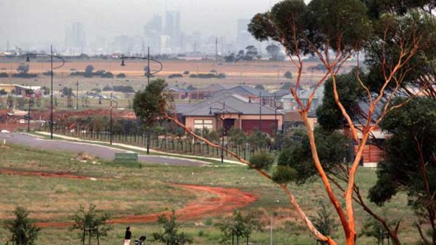 Urban sprawl is increasingly encroaching on open paddocks, such as in Tarneit, as the city has been dramatically extended.