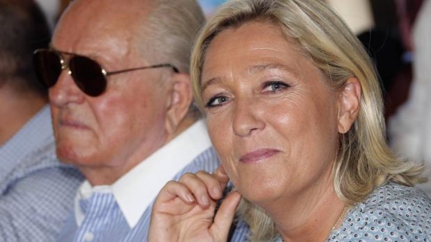 In happier times: National Front leader Marine Le Pen with her father, party founder Jean-Marie Le Pen.