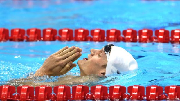 Frenchman Yannick Agnel celebrates his 200m freestyle victory at the London Olympics.