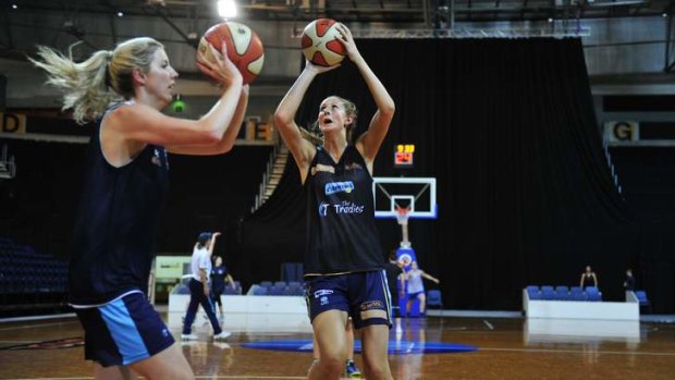 Canberra Capitals players Carly Wilson and Carley Mijovic at training.