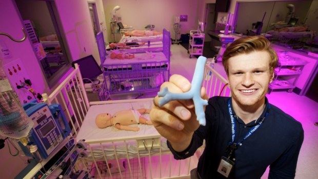 Mitchell Finlayson , Simulation Technologist with a 3D print at the Royal Childrens Hospital.