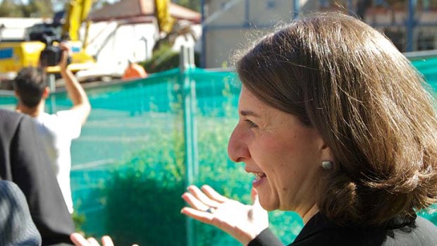 New tunnels won't accomodate for CityRail's double-deck trains: Gladys Berejiklian looks on at demolition on a north-west rail link site.