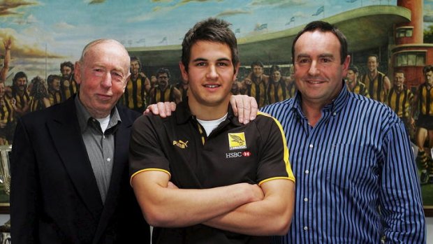 Family affair: Josh Kennedy with his grandfather John Kennedy snr and father, John Kennedy jnr, in 2006.