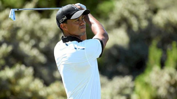 Stormed home: Tiger Woods had a storming back nine to finish at two under.