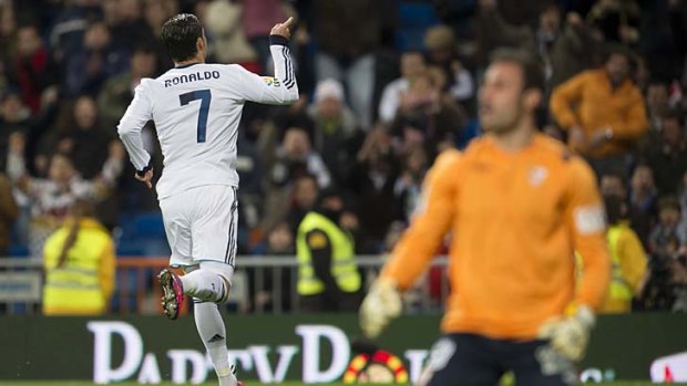 Cristiano Ronaldo celebrates scoring one of his three goals.