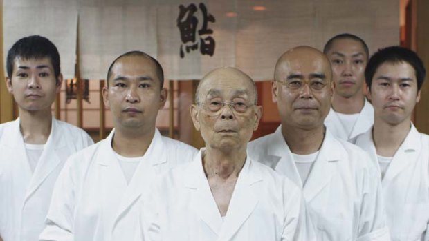Master's apprentice ... sushi master Jiro Ono (centre) with his team and his son, Yoshikazu (third from right).