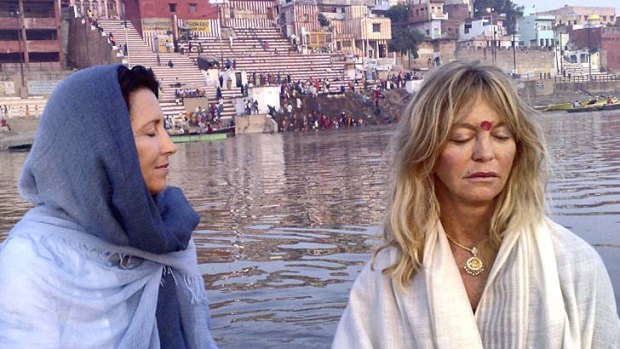 Seeking peace: Goldie Hawn meditates in a boat in Varanasi.