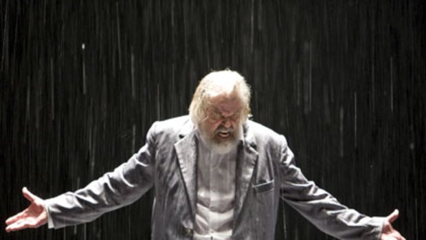 A mountain to climb ... Arnar Jonsson, as King Lear, contends with the heavy rain.