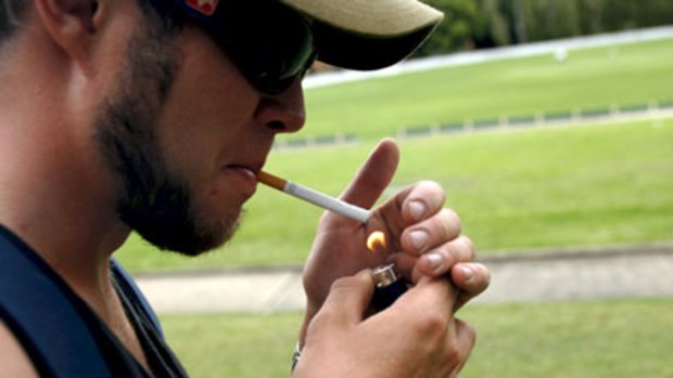 Men are lighting up far less than they were, but are still more likely to smoke than women.