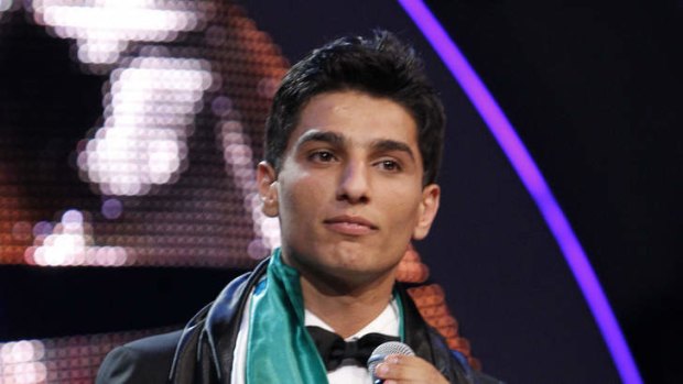 Palestinian singer Mohammed Assaf performs after winning the "Arab Idol" singing contest in Zouk Mosbeh, north of the Lebanese capital Beirut, early on June 23, 2013.