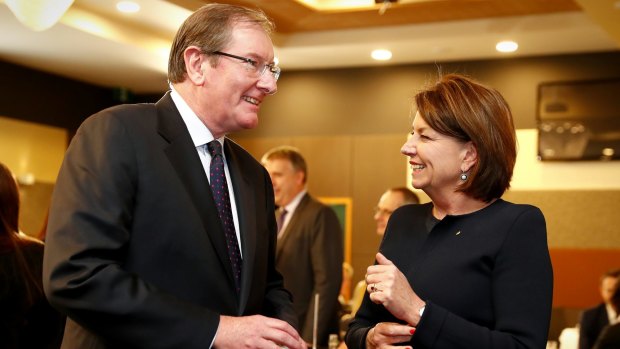 Brian Loughnane, former federal director of the Liberal Party, speaks with Anna Bligh, after her address to the National Press Club.