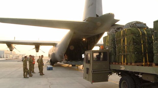 Australian Army personnel prepare a Hercules to drop supplies to isolated Iraqi civilians on Mount Sinjar in northern Iraq.