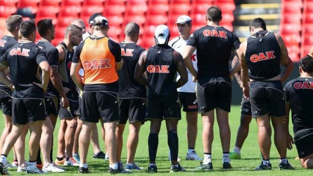 Listen up: Ivan Cleary addresses Panthers players at training on Wednesday.