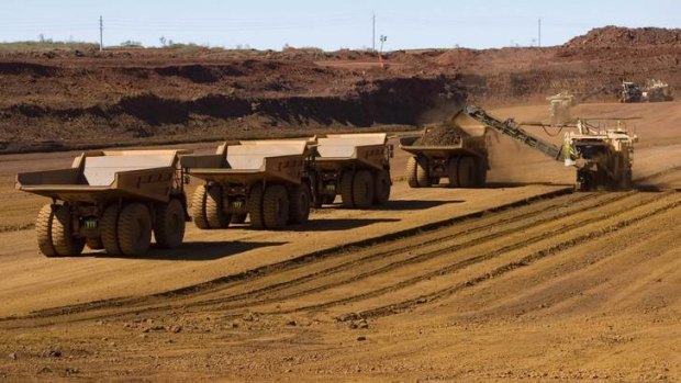 The global price of iron ore has slipped below $US100 a tonne for the first time since late 2009, with experts predicting future falls.