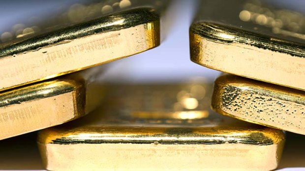 Gold bullion plunged 28 percent in 2013 as some investors lost their faith in the metal as a store of value.