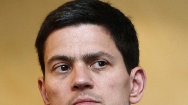 Britain's Foreign Minister David Miliband has demanded the release of Iranian employees of the British embassy in Tehran.