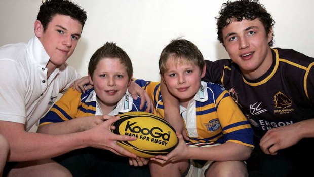 Big family units: The Burgess brothers at home in Dewsbury, West Yorkshire, in 2004, from left, Luke, 18, George and Thomas, 12, and Sam, 16.