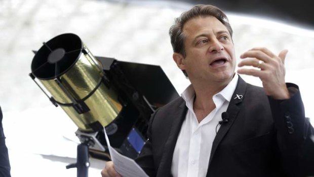 Peter Diamandis, co-chairman of Planetary Resources, talks to reporters about his company's plans for the world's first crowd funded space telescope.